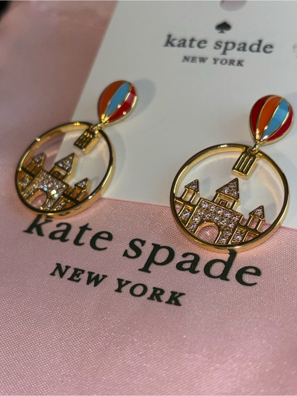 Kate Spade New York gold earrings with castle design and dust bag